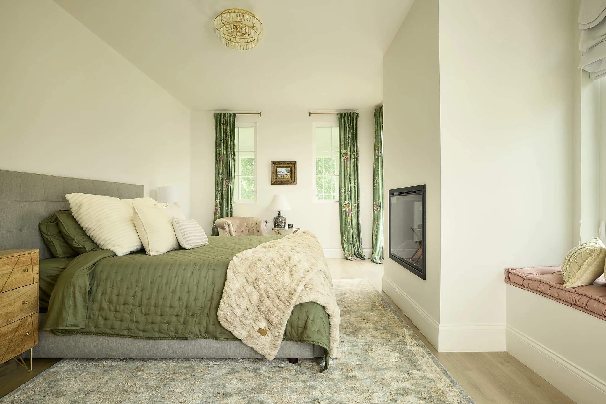 Completed primary bedroom with custom fireplace and tailored finishes in Meridian-Kessler.
